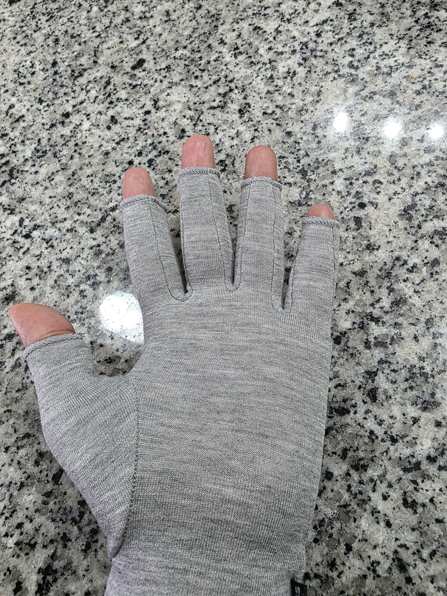 Customer wearing gray compression gloves