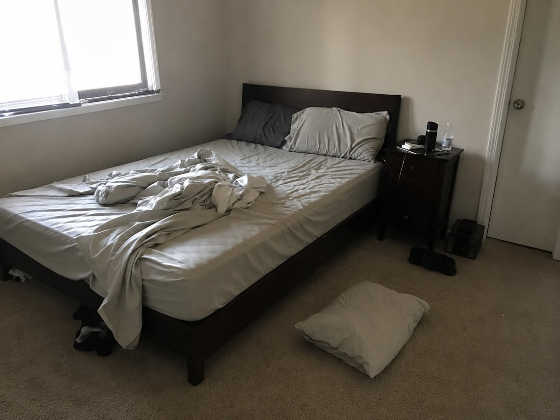 Pillow on the bedroom floor in the morning