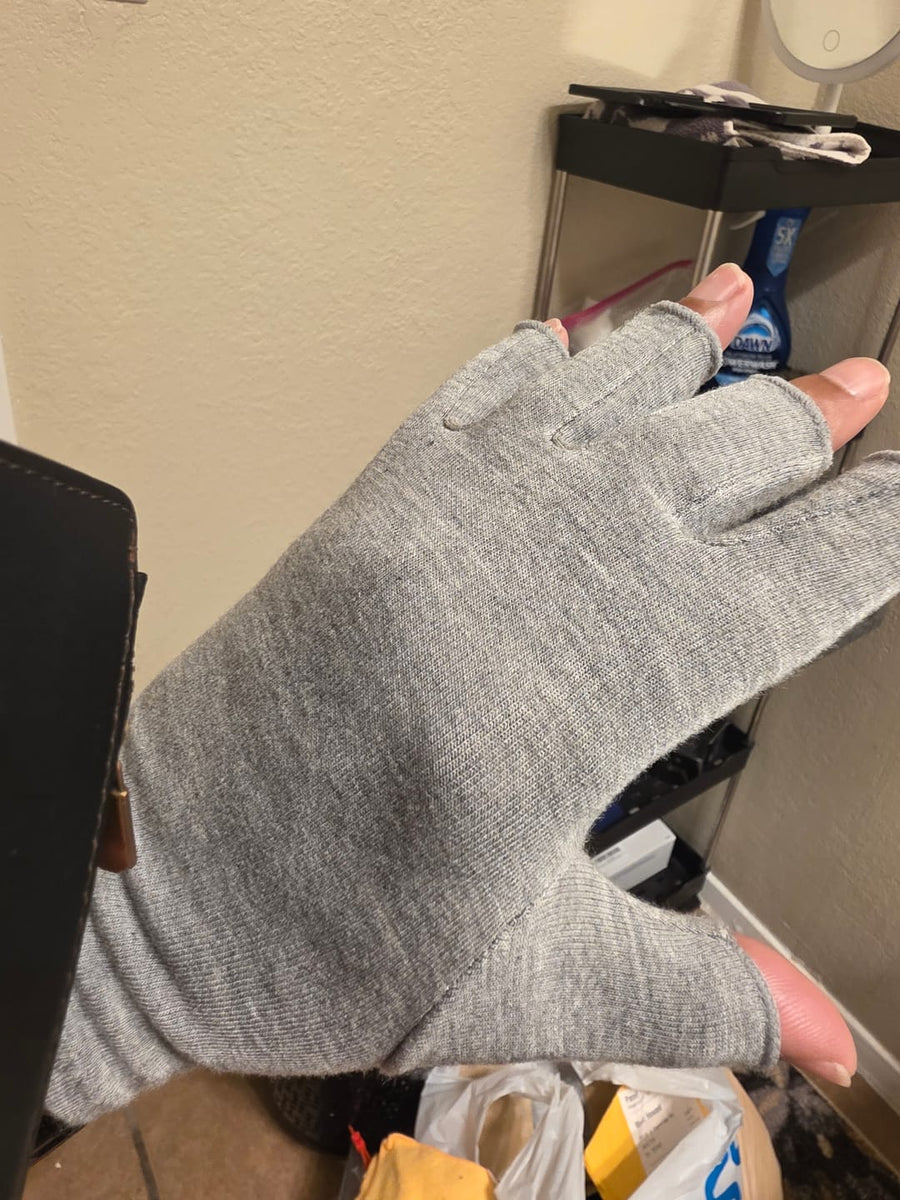 Customer wearing gray compression gloves